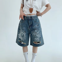 Shorts de Denim com Grafite Estressado 