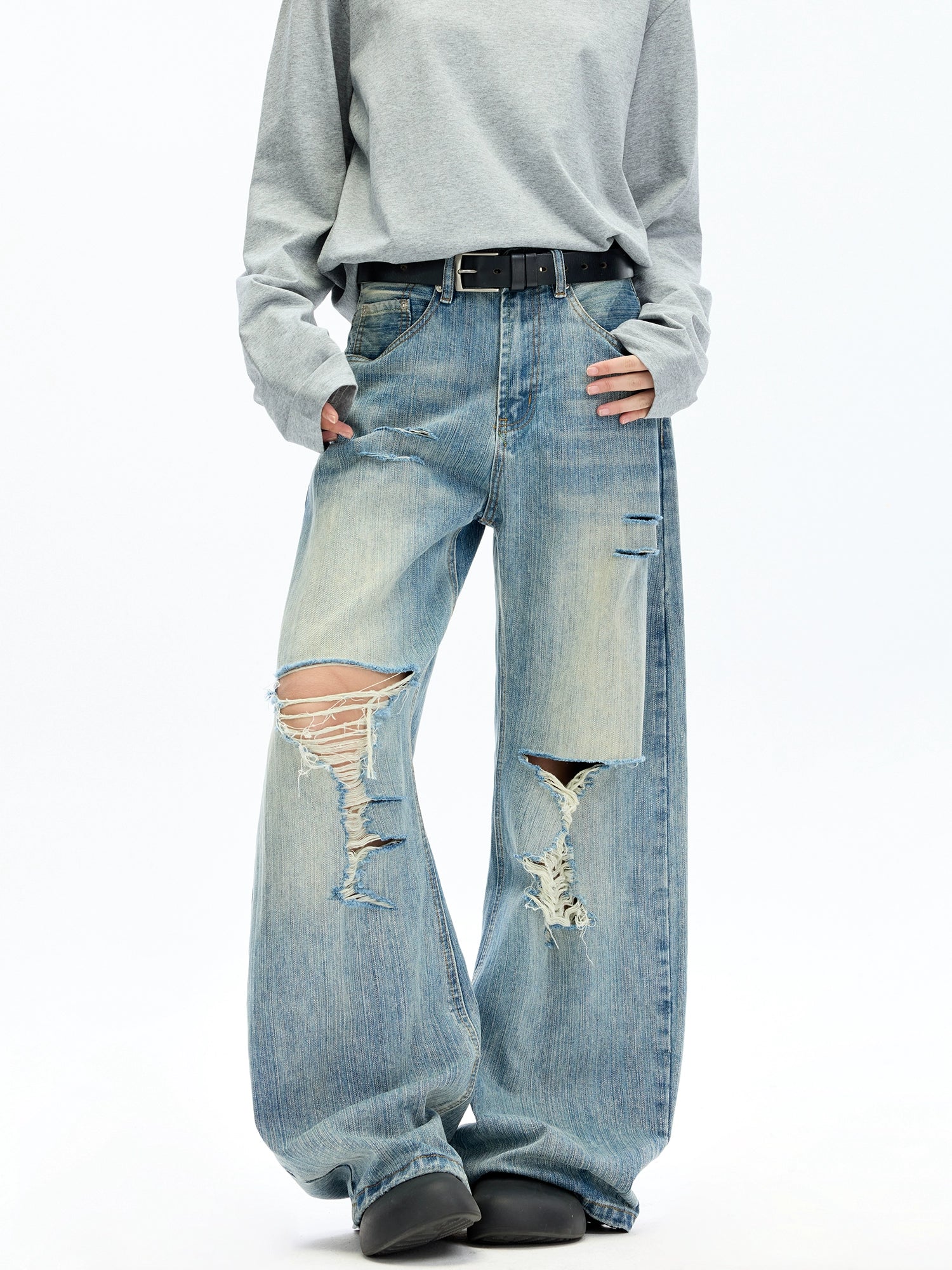 破れたダメージ加工のワイドレッグジーンズパンツ 