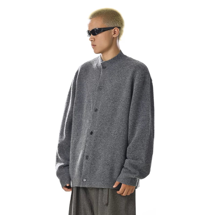 Rundhalslös stickad cardigantröja 