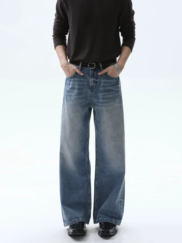 جينز واسع الساق بتصميم قديم ومغسول ومهترئ 