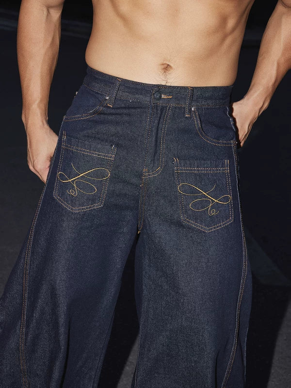 Pantalons en jean à jambes larges avec poches brodées 