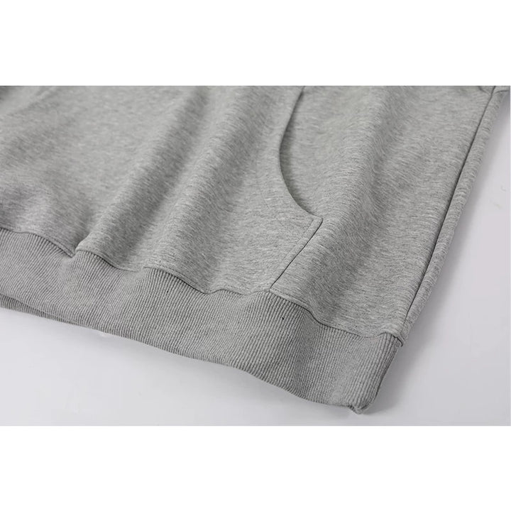 Sudadera suelta de pullover con hombros al descubierto 