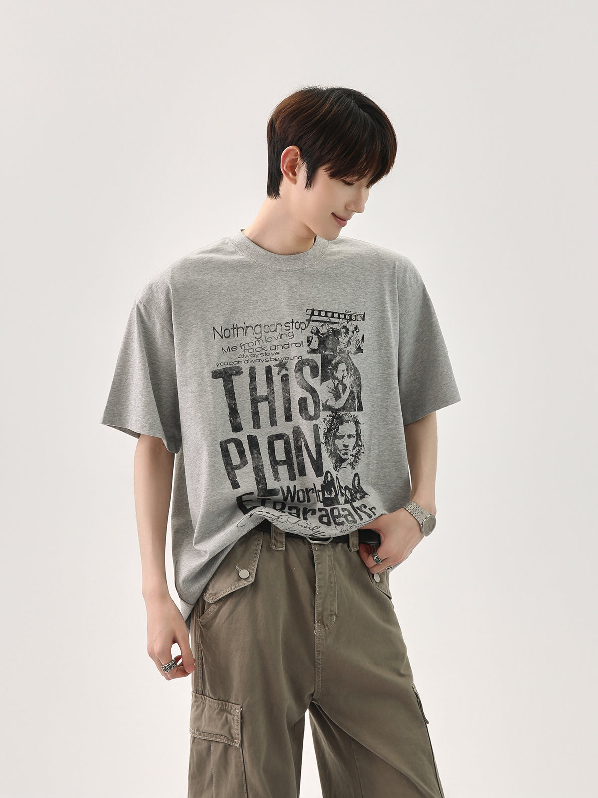 تي شيرت فضفاض برسومات ريترو متآكلة 