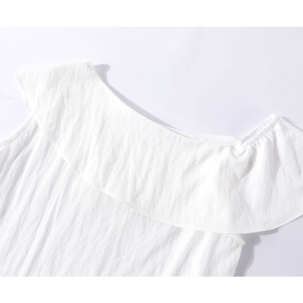 Haut en peplum sans manches à épaules dénudées avec volants 