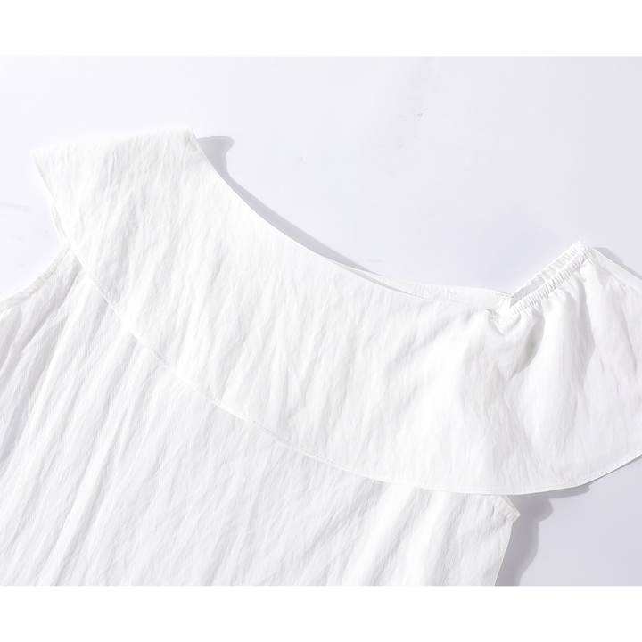 Haut en peplum sans manches à épaules dénudées avec volants 