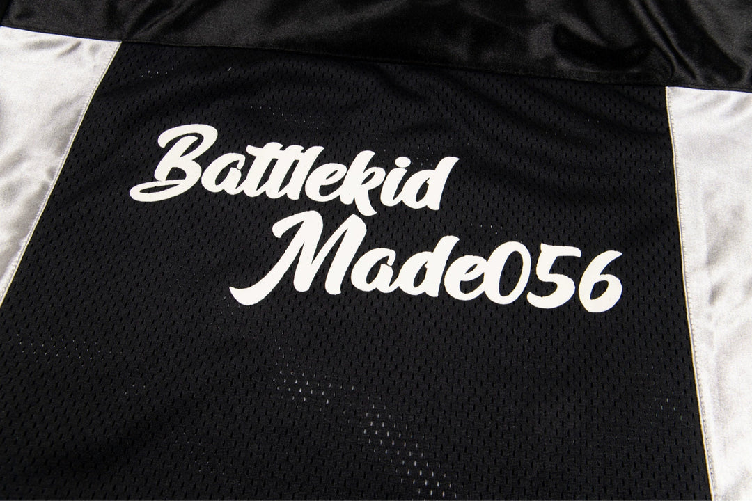 Maillot de sport en mesh à col en V à manches courtes 