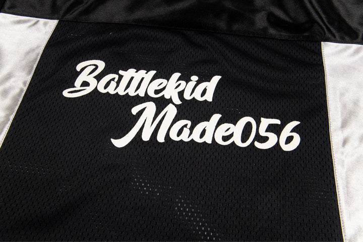Maillot de sport en mesh à col en V à manches courtes 