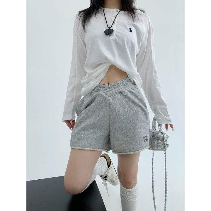 Oblique Waist Distressed Embroidered Shorts