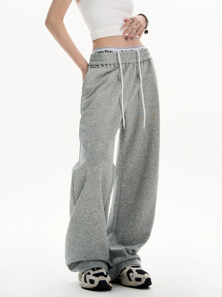 Uppsvängda sweatpants med dragsko i midjan 