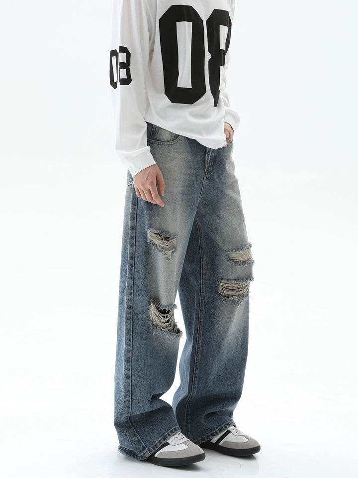 Jeans larges déchirés à taille haute 