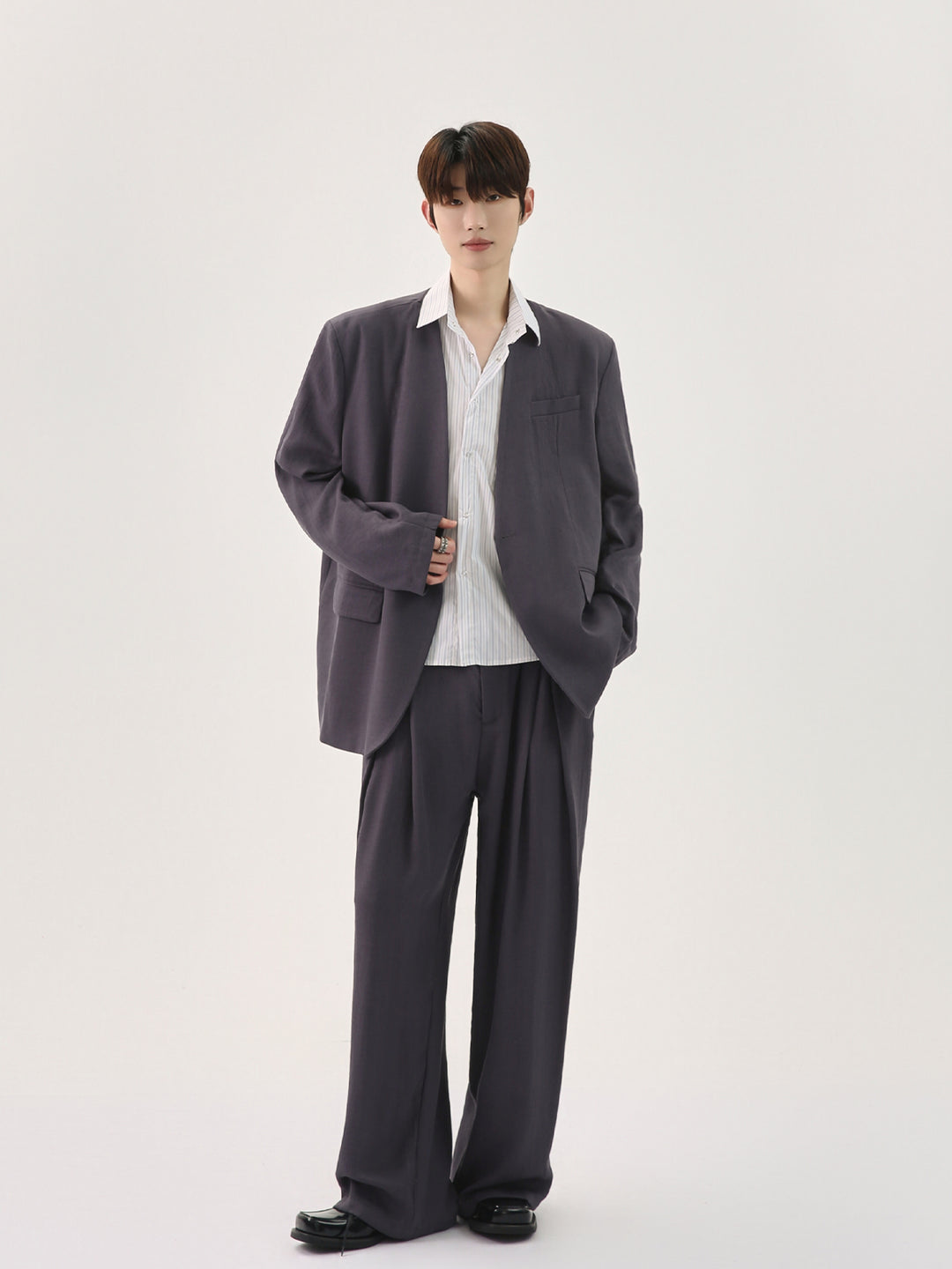 벨트가 탈부착 가능한 캐주얼 칼라리스 수트 