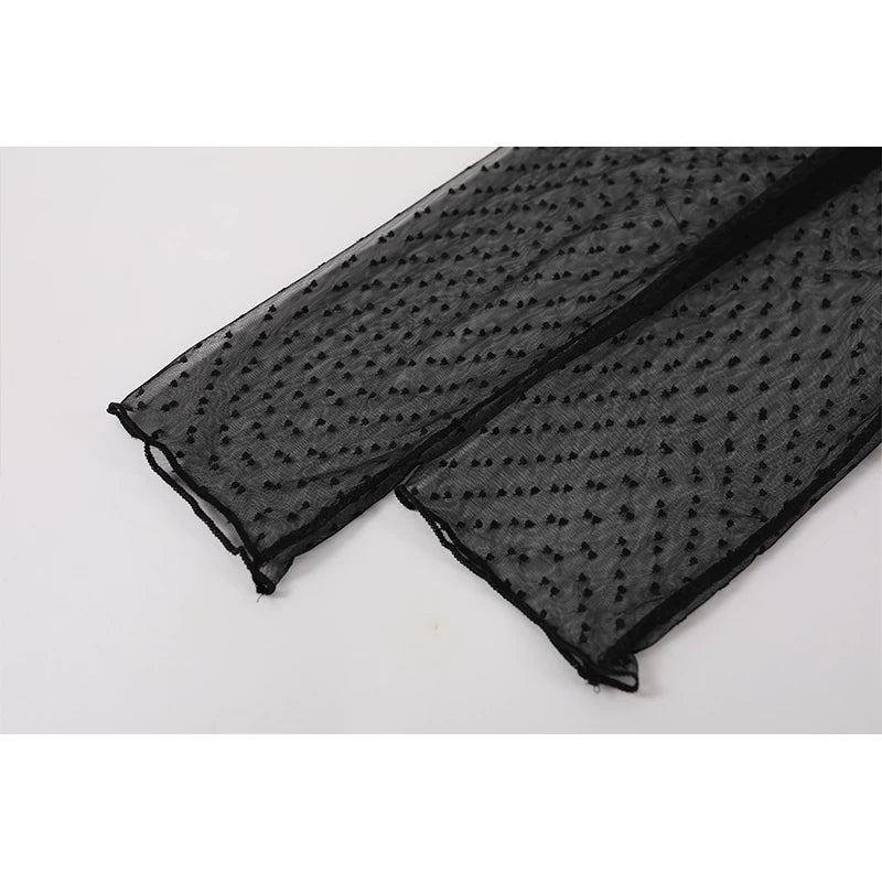 Polka Dot Mesh Ruffle Hem Turtleneck Top