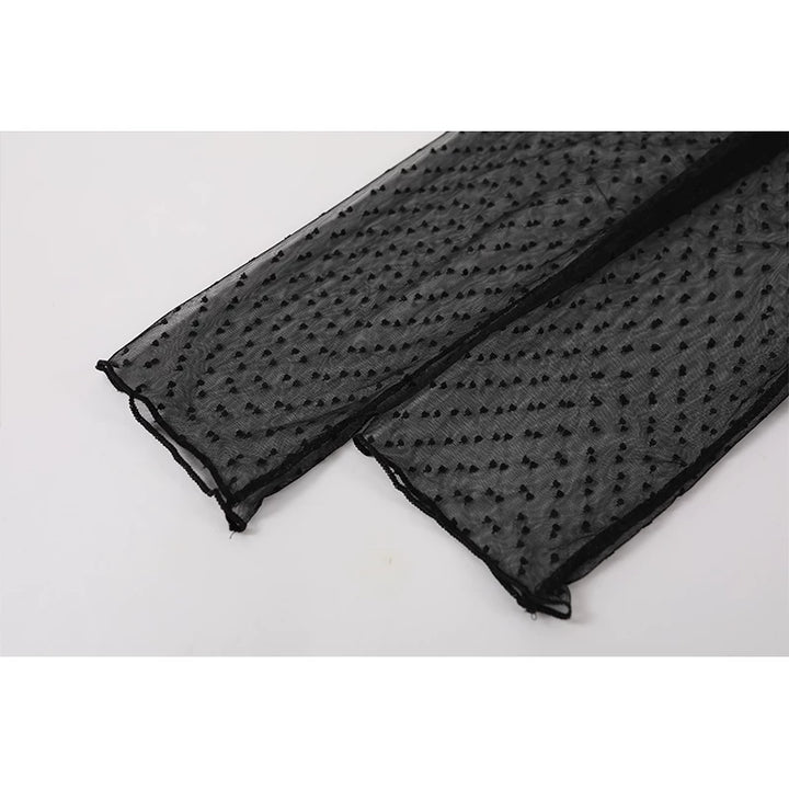 Polka Dot Mesh Ruffle Hem Turtleneck Top