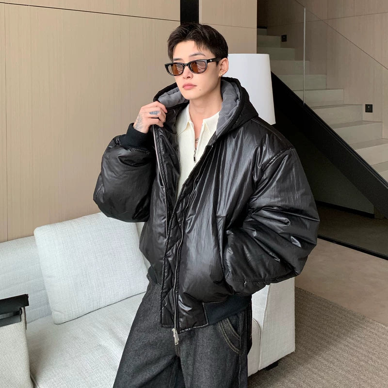 Glanzende PU-lederen gewatteerde jas met capuchon 