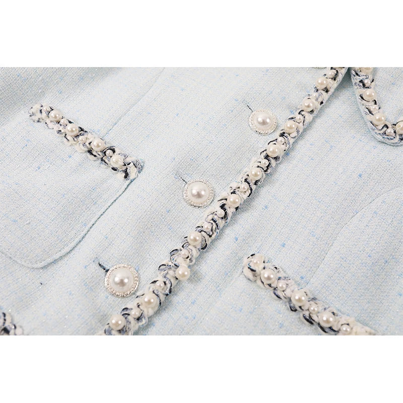 סט של ז'קט קצר מבד טוויד וחצאית 