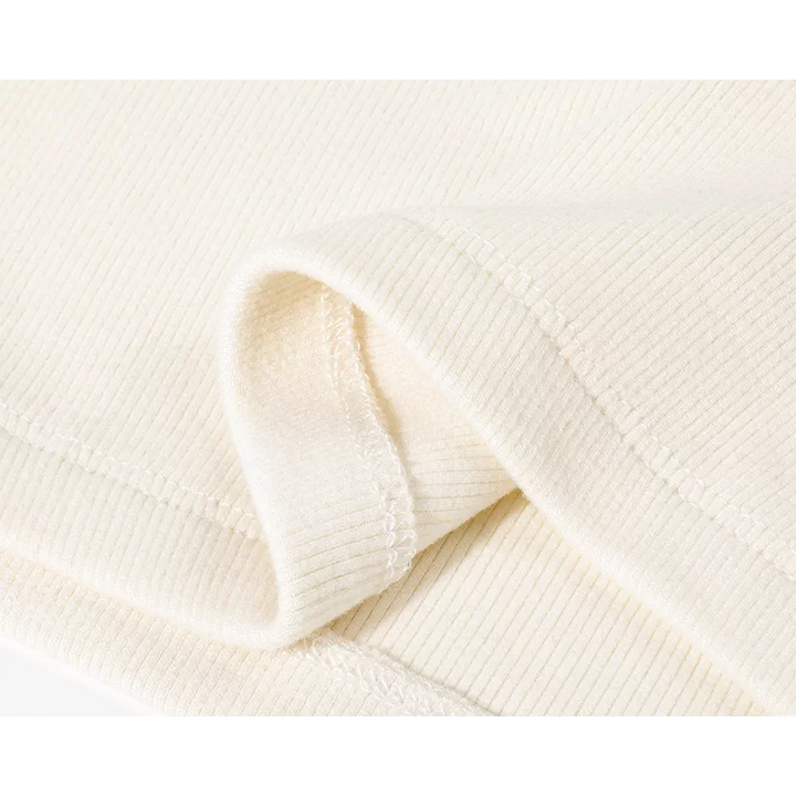 Top de punto ajustado con cuello alto 