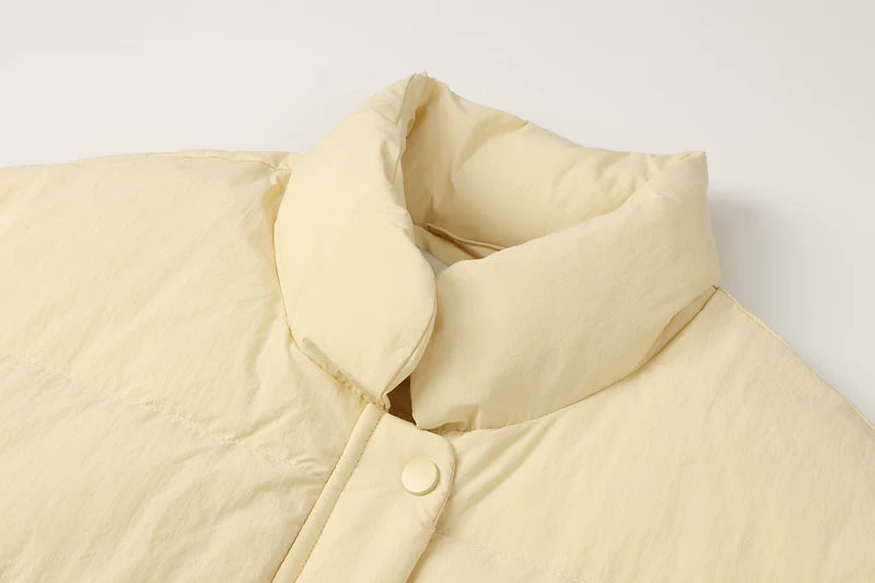 Løs passform ståkrage dunvest 