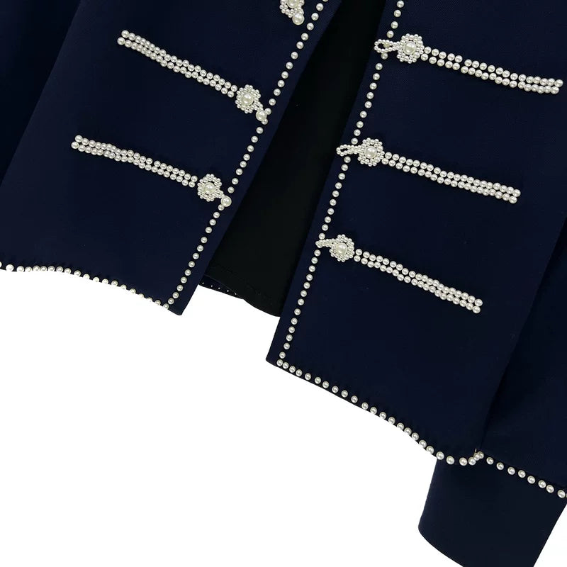 Perlová krátká bunda s korálkovým stojáčkem 