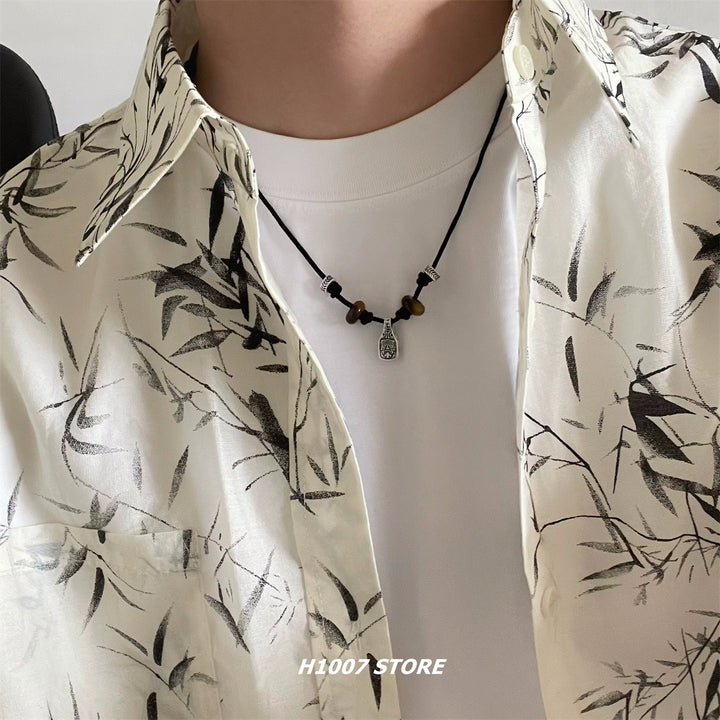 Collana intrecciata in pietra occhio di tigre 