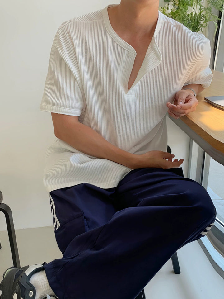 Pullover casual con colletto Henley a maniche corte 