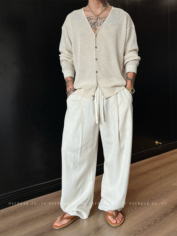 Pantaloni casual dritti a pieghe e drappeggio 