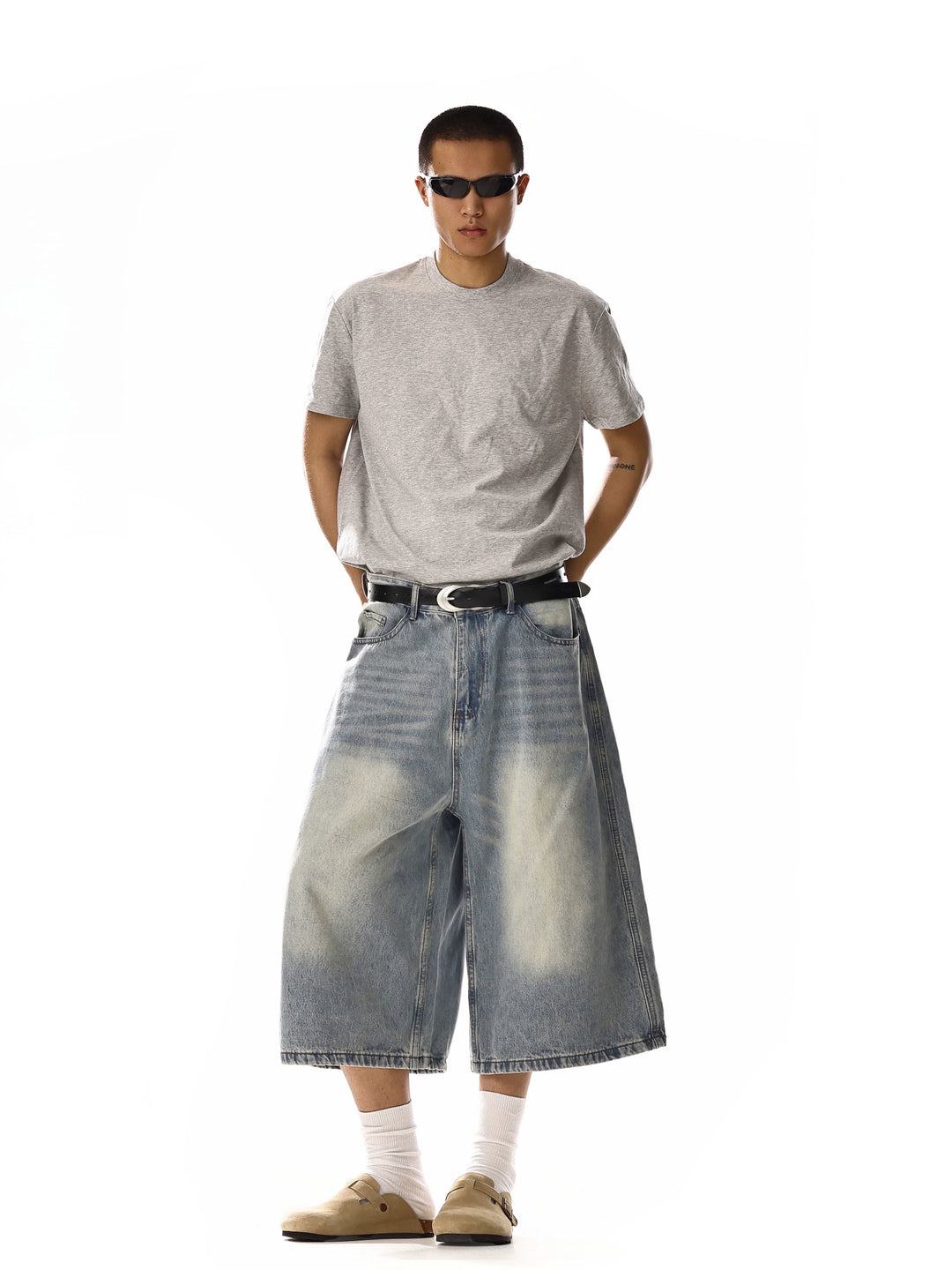 Pantalones de mezclilla casuales de pierna ancha hasta la rodilla 