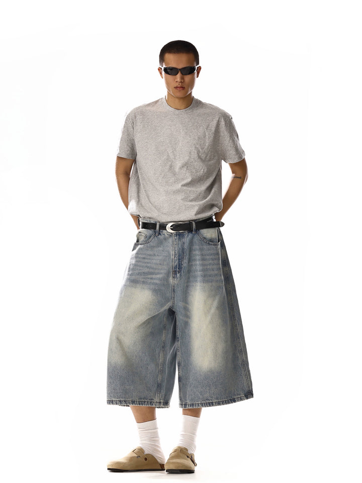 Pantalones de mezclilla casuales de pierna ancha hasta la rodilla 