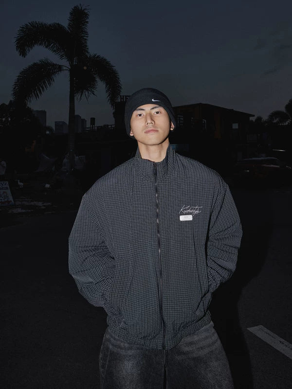 Veste zippée à carreaux avec col montant 