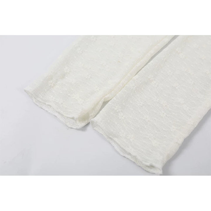 Top de peplum de encaje de manga larga con cuello alto 