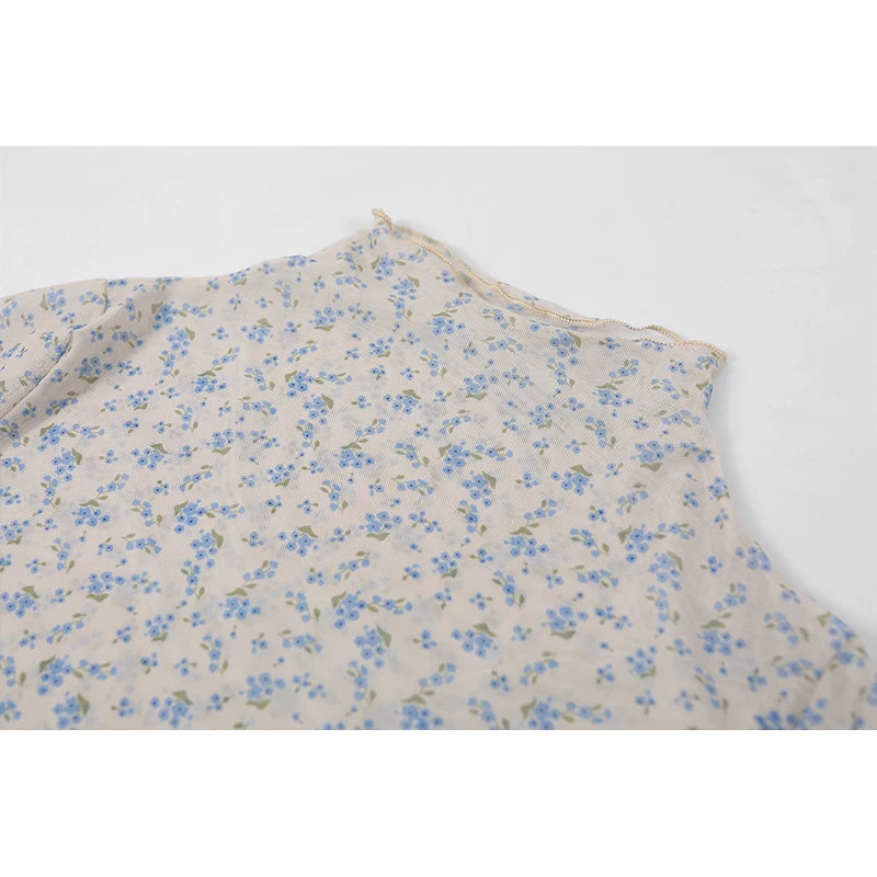 Top de malla de manga larga con cuello alto floral 