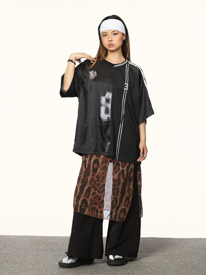 Top in jersey con scollo a V e inserti a strisce in rete 