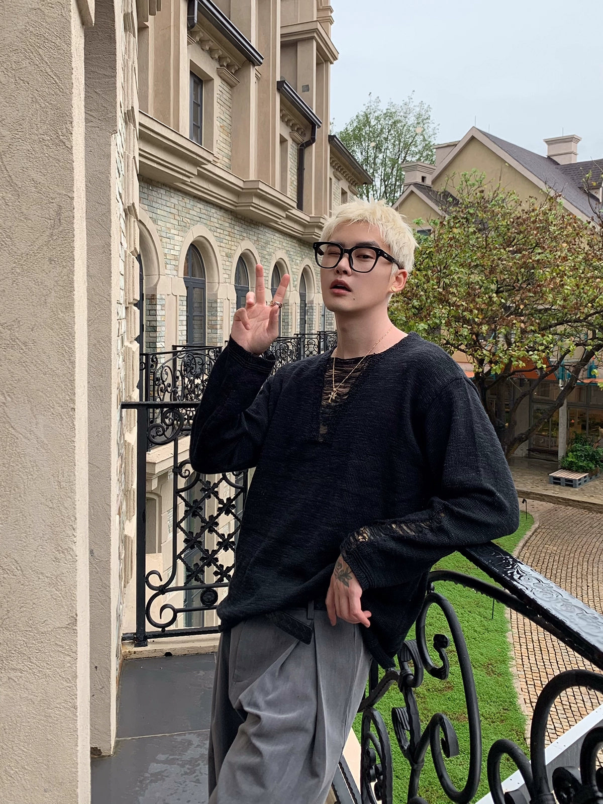 Distressed V-Neck Long Sleeve Knit Top