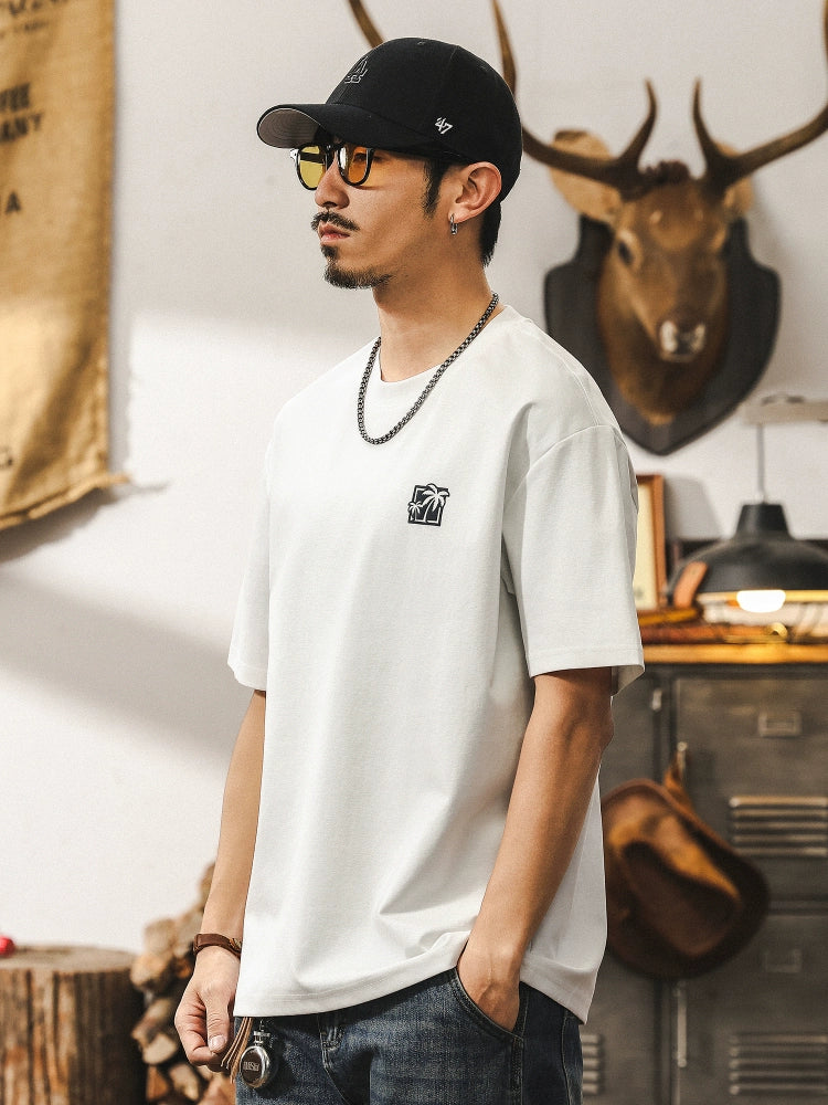 سويت شيرت فضفاض برسمة شجرة النخيل الرجعية 