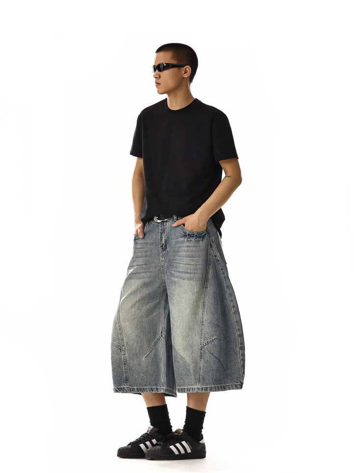 Pantalones cortos de mezclilla deconstruidos de pierna ancha 