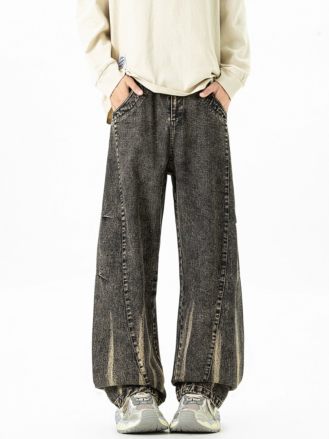 Pantalones de mezclilla deconstruidos de pierna ancha y lavados 