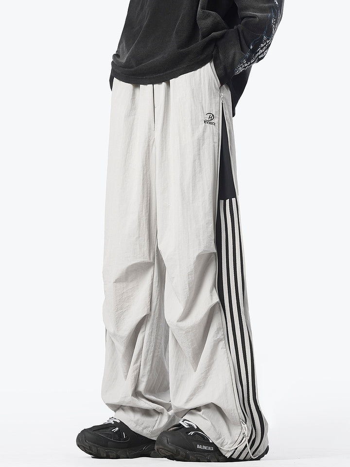 Pantalons décontractés à larges jambes rayés avec zip 