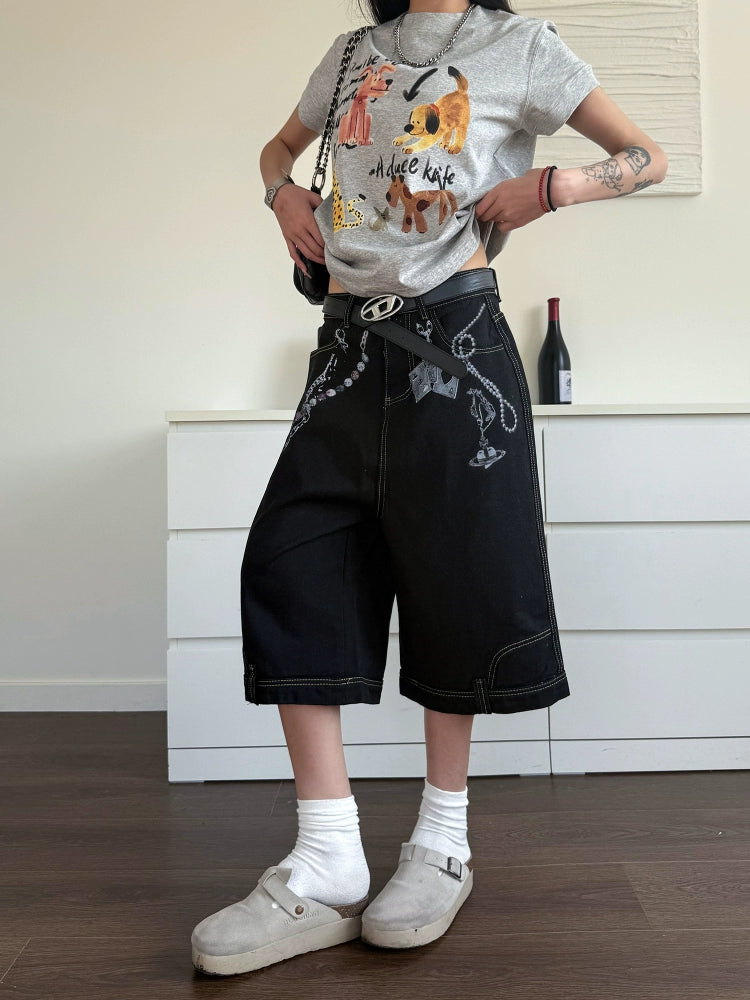 Pantaloni cropped in denim con stampa a catena 