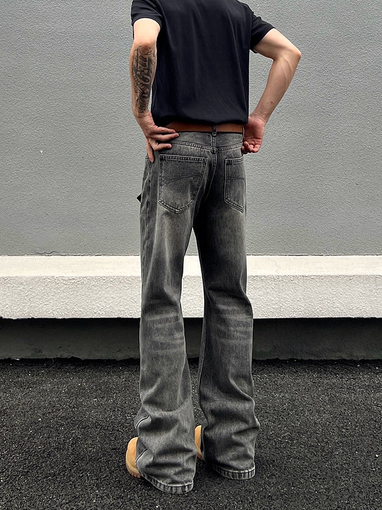 Jeans rectos acampanados desgastados 