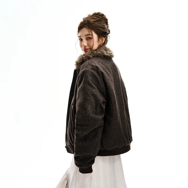 Quiltad ull bomberjacka med pälskrage 