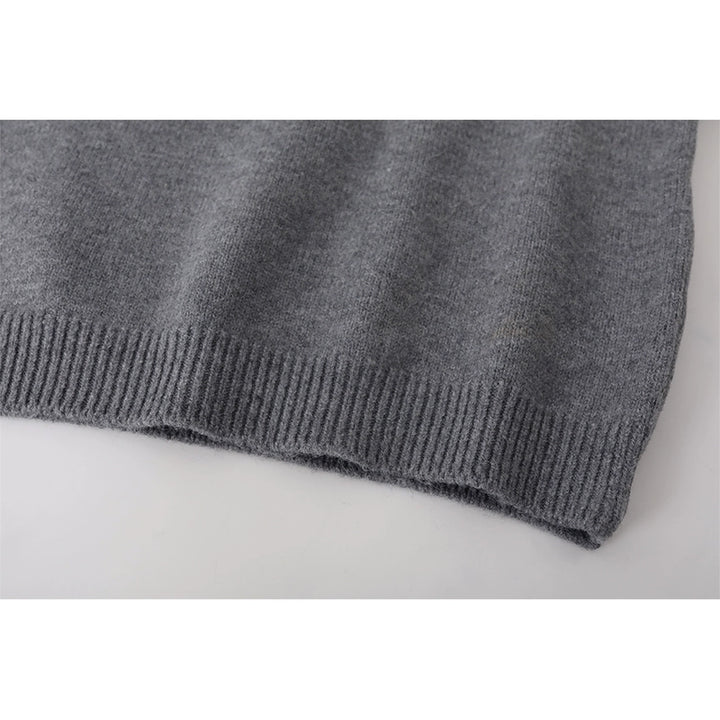 Knitted Sweater and Pleated Skirt
