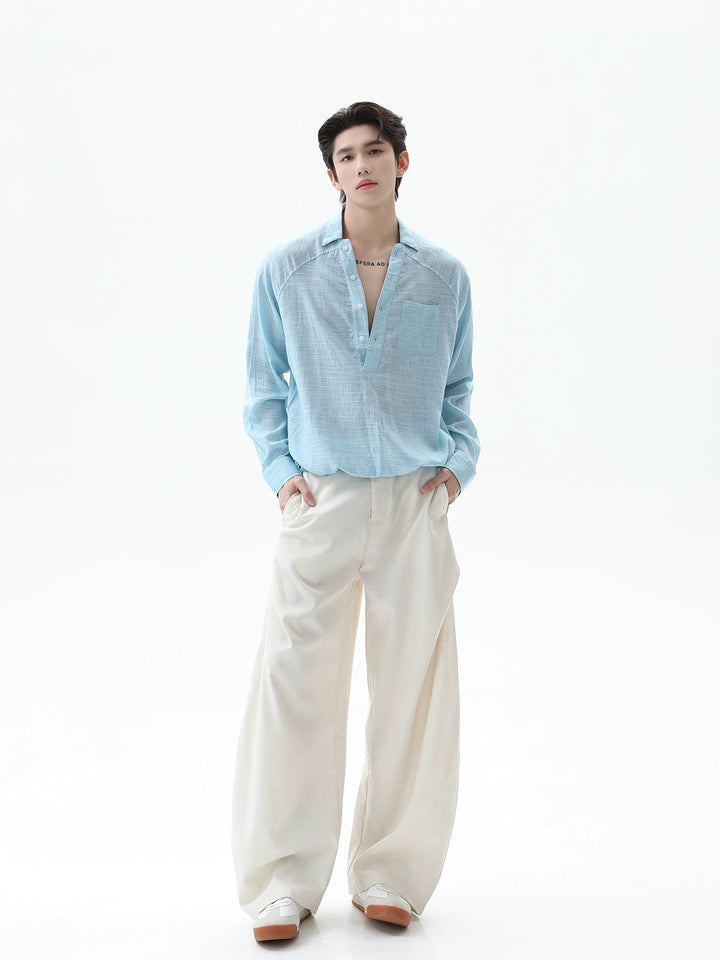 Chemise à boutons à manches raglan en lin avec col en V 