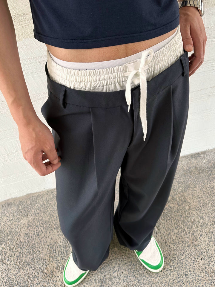 Pantaloni a gamba larga plissettati con vita elastica 