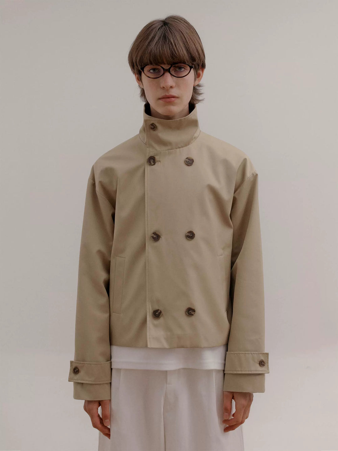 Manteau trench court à double boutonnage 