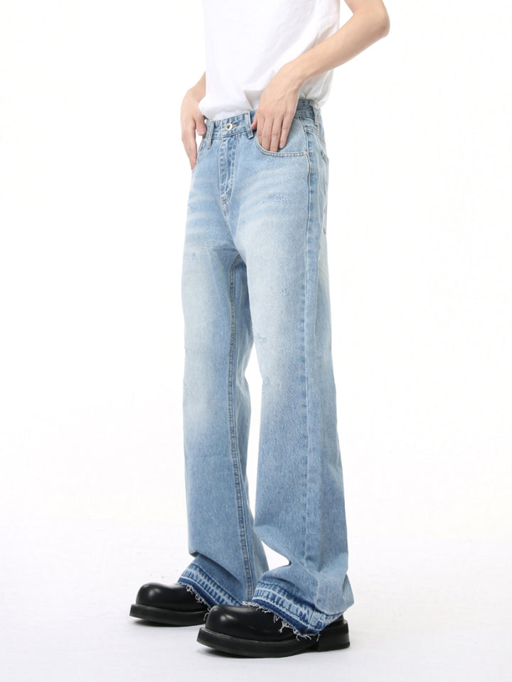 Mid-Waist Ripped Flared Jeans 