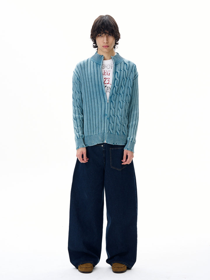 Cardigan in maglia a treccia con zip e strappi 