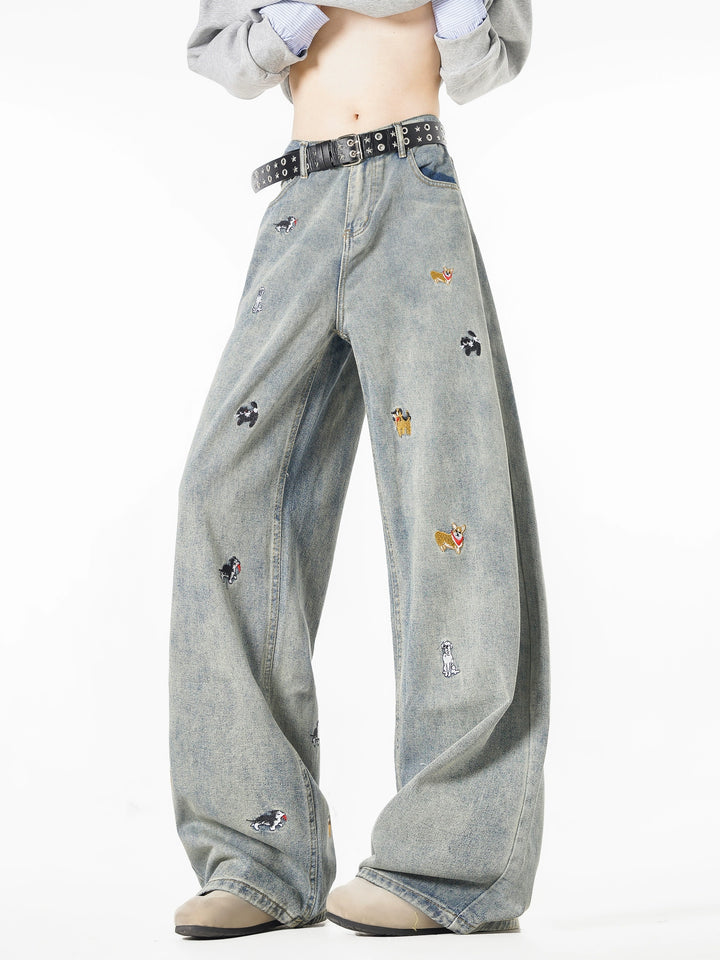 بنطلون جينز واسع الساق مطرّز بجرو 