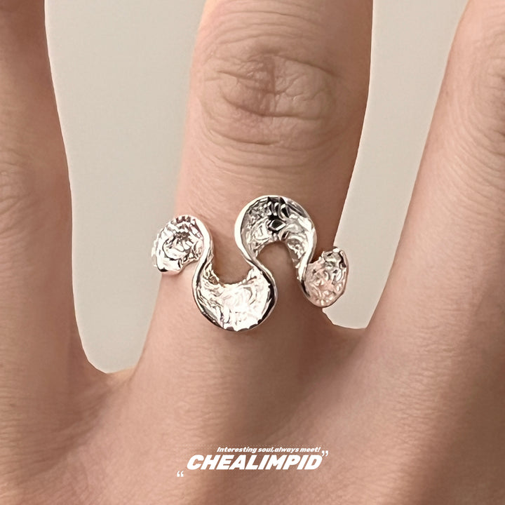 Irregular Twisted Geometric Open Ring