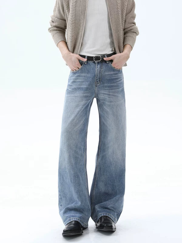 بنطلون جينز واسع الساق مُغسَل ومُتَآكِل 