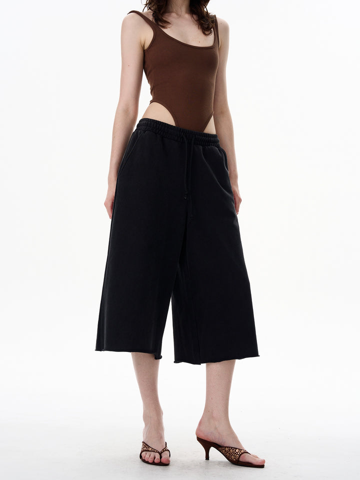 Pantalones cortos de sudadera de siete puntos sueltos Drape 
