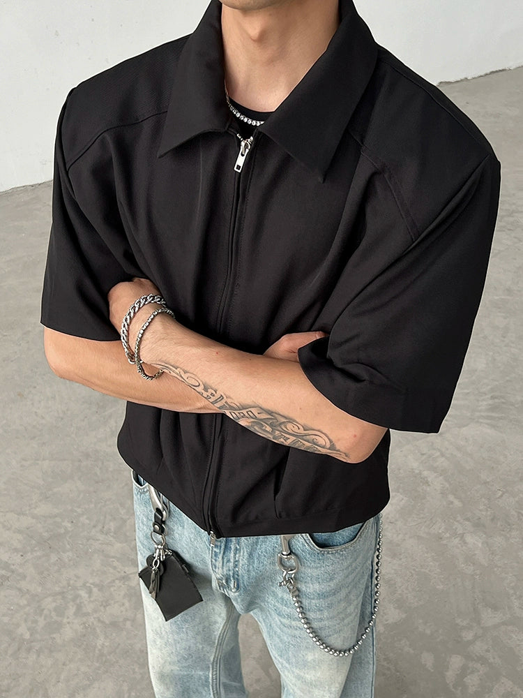 Chaqueta con cremallera de manga corta y hombreras 